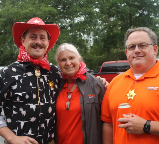 Zach Bechtel, Pat McCoy, and Matt Robbins participate in Rodeo day at Trident Construction's May Superintendents Meeting.