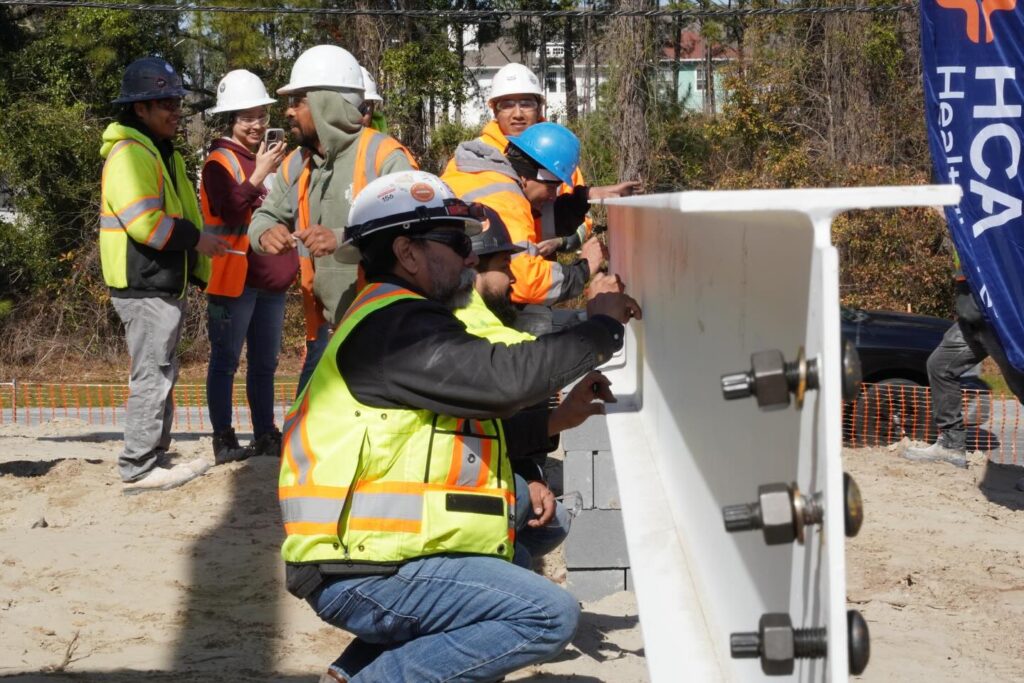 Congratulations to HCA Healthcare and the project team at the Johns Island ER on reaching another major milestone! This morning, we celebrated the topping out of the new facility, an important step toward completion this fall. It was a great opportunity to gather with community partners, subcontractors, and our client to recognize the progress made and the lasting impact this project will have on John’s Island through expanded access to quality care. We are grateful for the opportunity to be part of this important project and proud to help deliver a facility that will serve this community for years to come! 

#teambuild #tridentconstruction #johnsisland #memorablemoments