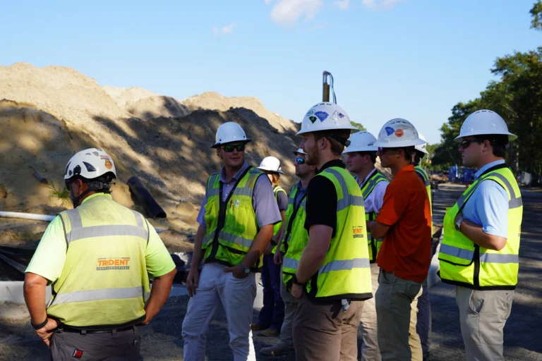 Our Project Engineers recently had the opportunity to tour the Ashley Landing project site and see firsthand the progress being made on this unique development. The tour was led by the project's PE, giving the group an inside look at the challenges, successes, and day-to-day coordination that keep the project moving forward.

Unlike many of our projects, Ashley Landing includes significant horizontal and civil infrastructure work. As we near completion of underground utilities, the tour provided a valuable learning experience for our team.

Just as important, it gave our Project Engineers the chance to connect, learn from one another, and build relationships as they begin their construction careers. Opportunities like these help foster camaraderie across our PE group while giving each team member the chance to share knowledge and lead their peers.

#charlestonconstruction #teambuild #growthmindset