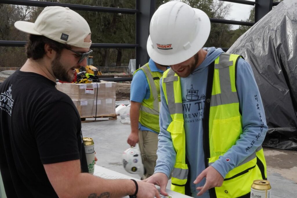 Low Tide Brewing has officially topped out their new home! We celebrated this major milestone alongside their amazing team and our dedicated subcontractors who helped bring the structure to this point. These moments reflect the strength of collaboration and the pride we take in working with talented local partners to create exciting new spaces on Johns Island. We’re grateful to be part of Low Tide Brewing’s continued growth! 

#toppingout #lowtidebrewing #charlestonconstruction #tridentconstruction #memorablemoments
